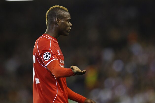 Liverpool's Mario Balotelli gestures during the Champions League group B soccer match between Liverpool and Real Madrid at Anfield Stadium, Liverpool, England, Wednesday Oct. 22, 2014. (AP Photo/Jon Super)