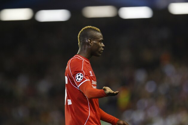 Liverpool's Mario Balotelli gestures during the Champions League group B soccer match between Liverpool and Real Madrid at Anfield Stadium, Liverpool, England, Wednesday Oct. 22, 2014. (AP Photo/Jon Super)