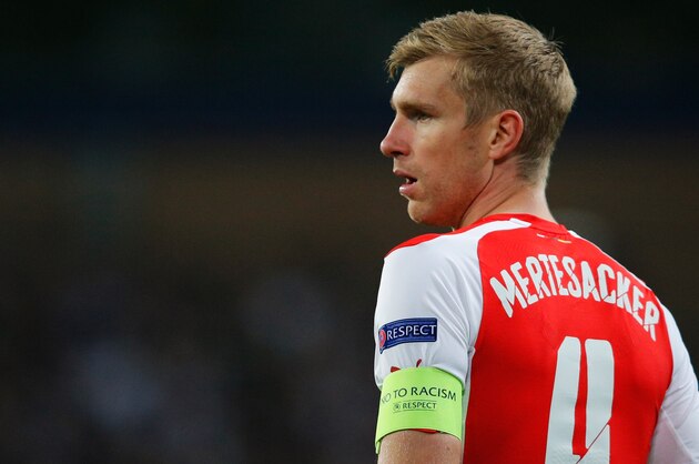 BRUSSELS, BELGIUM - OCTOBER 22:  Per Mertesacker of Arsenal looks on during the UEFA Champions League Group D match between RSC Anderlecht and Arsenal at Constant Vanden Stock Stadium on October 22, 2014 in Brussels, Belgium.  (Photo by Dean Mouhtaropoulos/Getty Images)