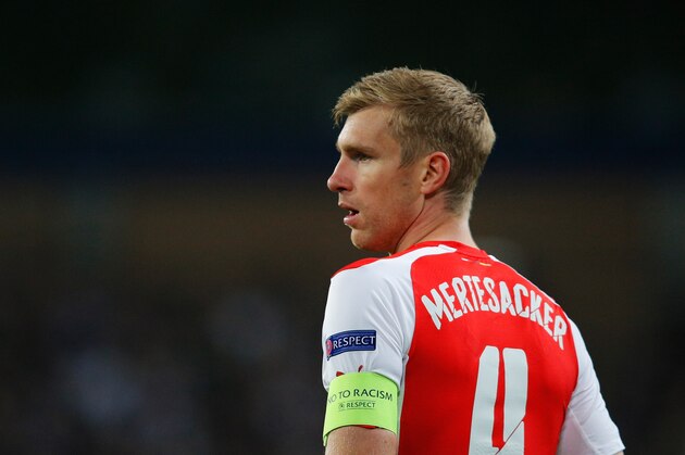 BRUSSELS, BELGIUM - OCTOBER 22:  Per Mertesacker of Arsenal looks on during the UEFA Champions League Group D match between RSC Anderlecht and Arsenal at Constant Vanden Stock Stadium on October 22, 2014 in Brussels, Belgium.  (Photo by Dean Mouhtaropoulos/Getty Images)