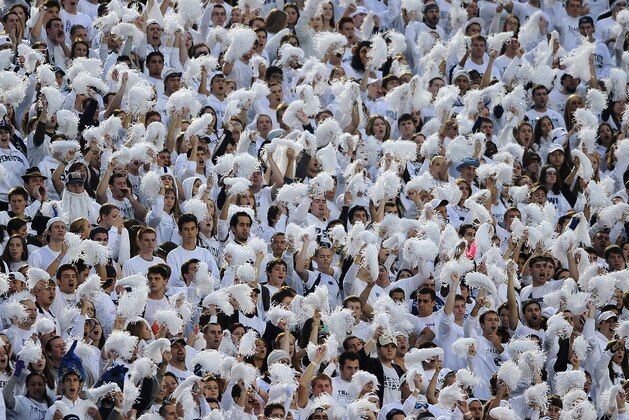 STATE COLLEGE, PA - OCTOBER 27: Penn State Nittany Lions fans cheer during a 'White Out' game against the Ohio State Buckeyes at Beaver Stadium on October 27, 2012 in State College, Pennsylvania. The Ohio State Buckeyes won, 35-23. (Photo by Patrick Smith/Getty Images)