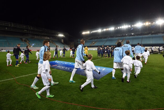 KHIMKI, RUSSIA - OCTOBER 21: Players are entering the field before the UEFA Champions League Group E match between PFC CSKA Moscow and Manchester City FC at the Arena Khimki Stadium on October 21, 2014 in Khimki, Russia.  (Photo by Epsilon/Getty Images)