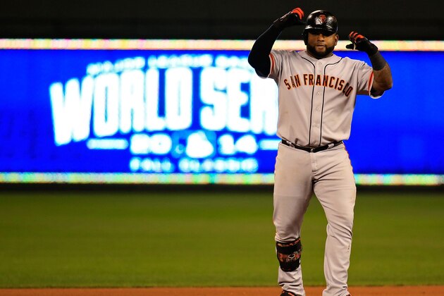 KANSAS CITY, MO - OCTOBER 22: Pablo Sandoval #48 of the San Francisco Giants celebrates after hitting a double against the San Francisco Giants in the fourth inning during Game Two of the 2014 World Series at Kauffman Stadium on October 22, 2014 in Kansas City, Missouri.  (Photo by Jamie Squire/Getty Images)