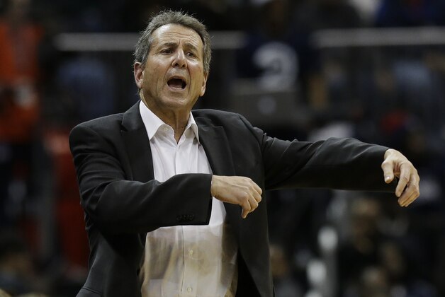 Atlanta Hawks managing partner Bruce Levenson yells at an official in the second half of an NBA  basketball game Wednesday, Dec. 4, 2013, in Atlanta.  Atlanta won 107-97. (AP Photo/John Bazemore)