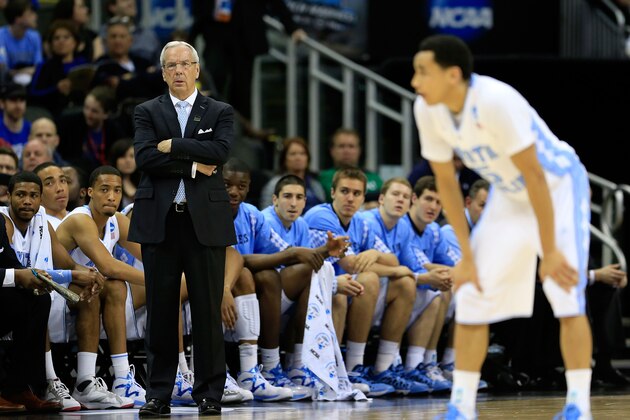 KANSAS CITY, MO - MARCH 22:  Head coach Roy Williams of the North Carolina Tar Heels watches play as Marcus Paige #5 stands on the court in the first half against the Villanova Wildcats during the second round of the 2013 NCAA Men's Basketball Tournament at the Sprint Center on March 22, 2013 in Kansas City, Missouri.  (Photo by Jamie Squire/Getty Images)