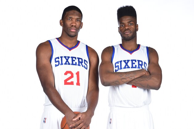 PHILADELPHIA, PA - SEPTEMBER 29:  Joel Embiid #21 and Nerlens Noel #4 of the Philadelphia 76ers during NBA Media Day on September 29, 2014 at Wells Fargo Center in Philadelphia, Pennsylvania. NOTE TO USER: User expressly acknowledges and agrees that, by downloading and or using this photograph, User is consenting to the terms and conditions of the Getty Images License Agreement. Mandatory Copyright Notice: Copyright 2014 NBAE (Photo by Jesse D. Garrabrant/NBAE via Getty Images)