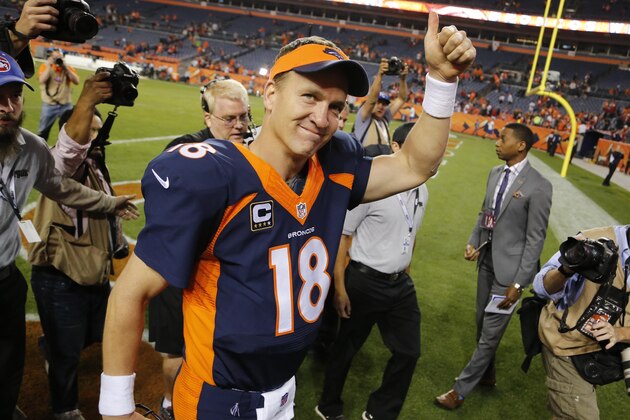 Denver Broncos quarterback Peyton Manning (18) leaves the field after an NFL football game against the San Francisco 49ers, Sunday, Oct. 19, 2014, in Denver.  The Broncos won 42-17. (AP Photo/Jack Dempsey)