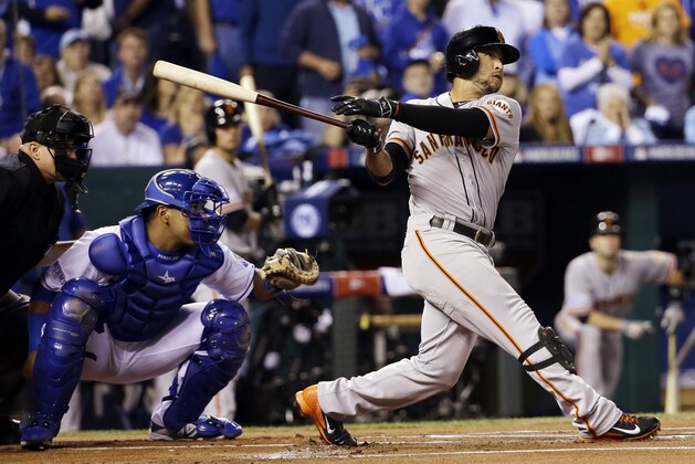 San Francisco Giants' Gregor Blanco hits a home run during the first inning of Game 2 of baseball's World Series against the Kansas City Royals Wednesday, Oct. 22, 2014, in Kansas City, Mo.  (AP Photo/David J. Phillip)