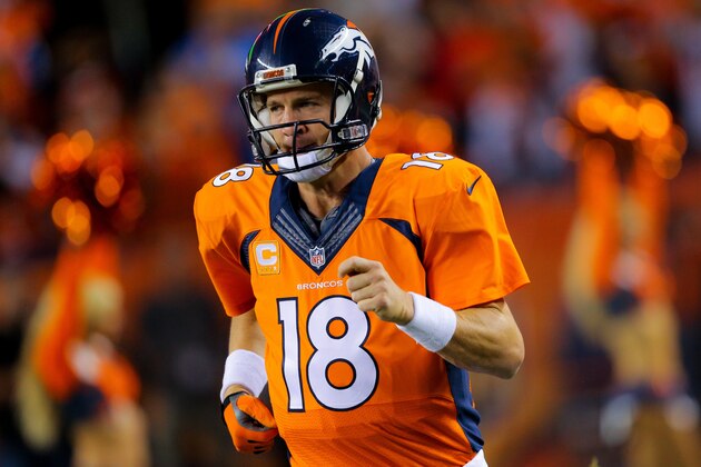 DENVER, CO - OCTOBER 23:  Quarterback Peyton Manning #18 of the Denver Broncos runs onto the field during player introductions before a game against the San Diego Chargers at Sports Authority Field at Mile High on October 23, 2014 in Denver, Colorado.  (Photo by Justin Edmonds/Getty Images)