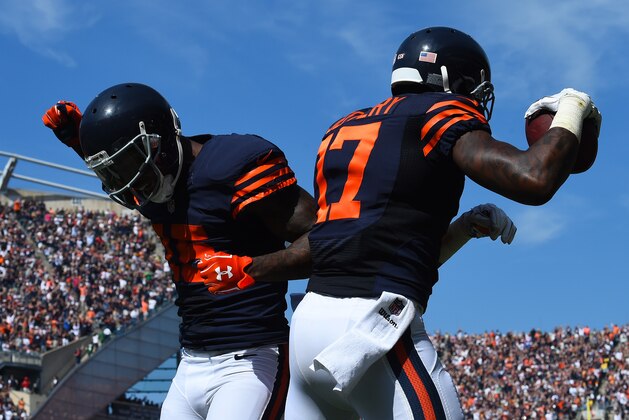 Sep 28, 2014; Chicago, IL, USA; Chicago Bears wide receiver Alshon Jeffery (17) reacts with  wide receiver Brandon Marshall (15) after scoring a touchdown against the Green Bay Packers during the first half at Soldier Field. Mandatory Credit: Mike DiNovo-USA TODAY Sports