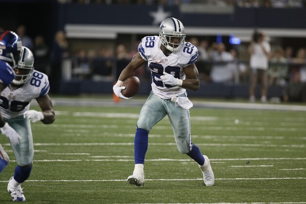 Dallas Cowboys running back DeMarco Murray (29) runs during the second half of an NFL football game, Sunday, Oct.  19, 2014, in Arlington, Texas. (AP Photo/Brandon Wade)