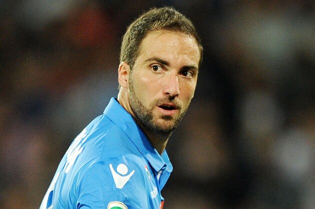 NAPLES, ITALY - OCTOBER 05:   Gonzalo Higuain of Napoli in action during the Serie A match between SSC Napoli and Torino at Stadio San Paolo on October 5, 2014 in Naples, Italy.  (Photo by Getty Images/Getty Images)