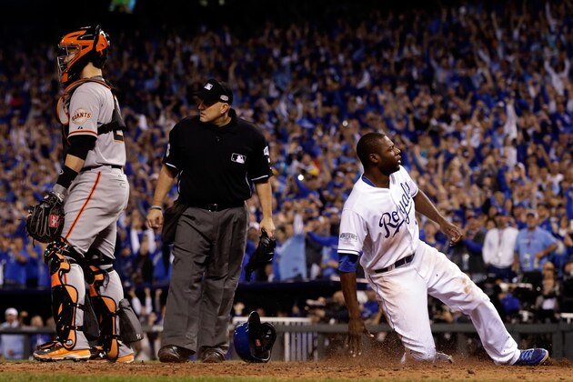 KANSAS CITY, MO - OCTOBER 22:  Lorenzo Cain #6 of the Kansas City Royals scores off a hit by Billy Butler #16 in the sixth inning against the San Francisco Giants during Game Two of the 2014 World Series at Kauffman Stadium on October 22, 2014 in Kansas City, Missouri.  (Photo by Jamie Squire/Getty Images)