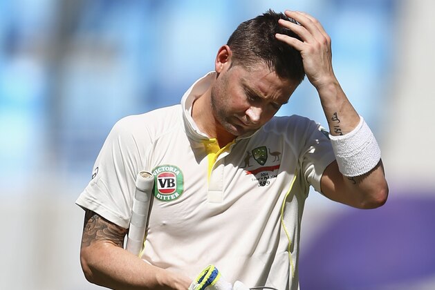 DUBAI, UNITED ARAB EMIRATES - OCTOBER 24:  Michael Clarke of Australia looks dejected after being dismissed by Zulfiqar Babar of Pakistan during Day Three of the First Test between Pakistan and Australia at Dubai International Stadium on October 24, 2014 in Dubai, United Arab Emirates.  (Photo by Ryan Pierse/Getty Images)