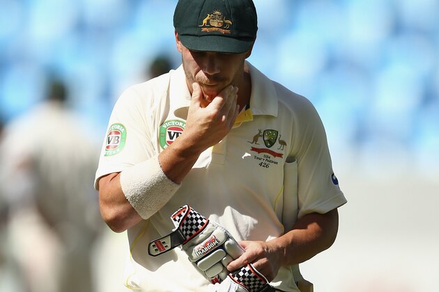 DUBAI, UNITED ARAB EMIRATES - OCTOBER 24:  David Warner of Australia looks dejected after being dismissed by Yasir Shah of Pakistan during Day Three of the First Test between Pakistan and Australia at Dubai International Stadium on October 24, 2014 in Dubai, United Arab Emirates.  (Photo by Ryan Pierse/Getty Images)