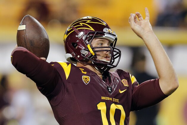Arizona State quarterback Taylor Kelly (10) warms up before an NCAA college football game against Stanford, Saturday, Oct. 18, 2014, in Tempe, Ariz. (AP Photo/Rick Scuteri)