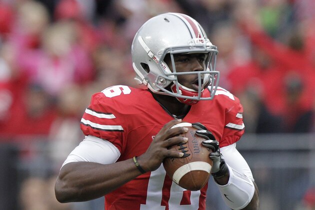 Ohio State quarterback J.T. Barrett plays against Rutgers during an NCAA NCAA college football game Saturday, Oct. 18, 2014, in Columbus, Ohio. (AP Photo/Jay LaPrete)