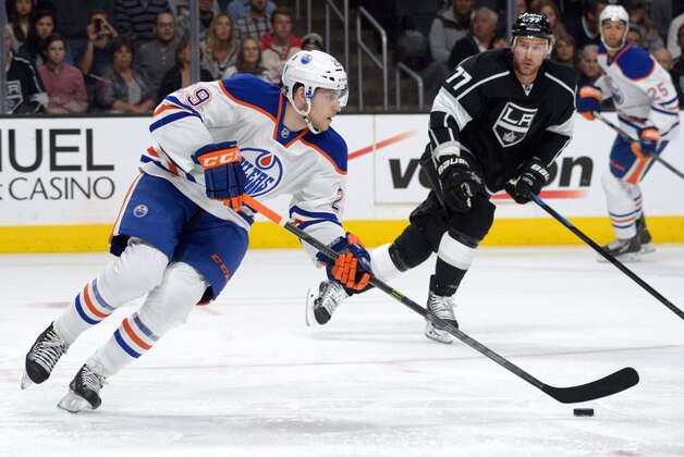 Oct 14, 2014; Los Angeles, CA, USA; Edmonton Oilers center Leon Draisaitl (29) handles the puck against the Los Angeles Kings at the Staples Center. Mandatory Credit: Kirby Lee-USA TODAY Sports