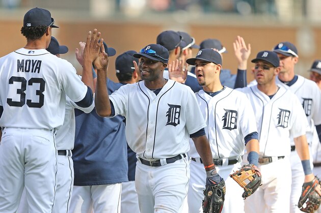 DETROIT, MI - SEPTEMBER 14: Torii Hunter #48 of the Detroit Tigers celebrates a win over the Cleveland Indians with his teammates at Comerica Park on September 14, 2014 in Detroit, Michigan. The Tigers defeated the Indians 6-4.  (Photo by Leon Halip/Getty Images)