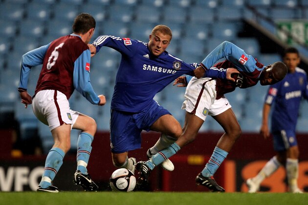BIRMINGHAM, ENGLAND - APRIL 29:  Gokhan Tore of Chelsea is challenged by Ebby Nelson-Addy (R) and Richard Blythe during the FA Youth Cup Final 1st leg between Aston Villa and Chelsea at Villa Park on April 29, 2010 in Birmingham, England.  (Photo by David Rogers/Getty Images)