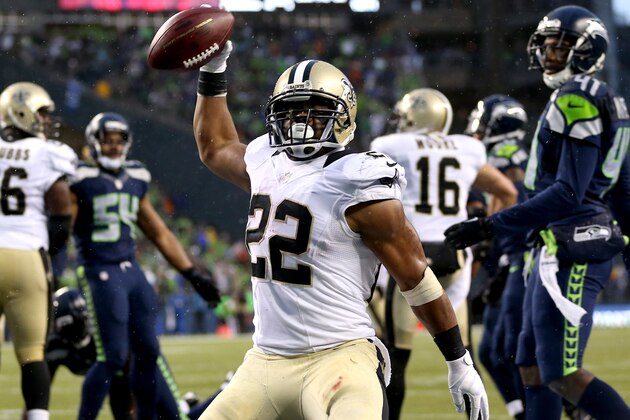 SEATTLE, WA - JANUARY 11:  Running back Mark Ingram #22 of the New Orleans Saints celebrates after scoring on a two-point conversion in the fourth quarter against the Seattle Seahawks during the NFC Divisional Playoff Game at CenturyLink Field on January 11, 2014 in Seattle, Washington.  (Photo by Jeff Gross/Getty Images)