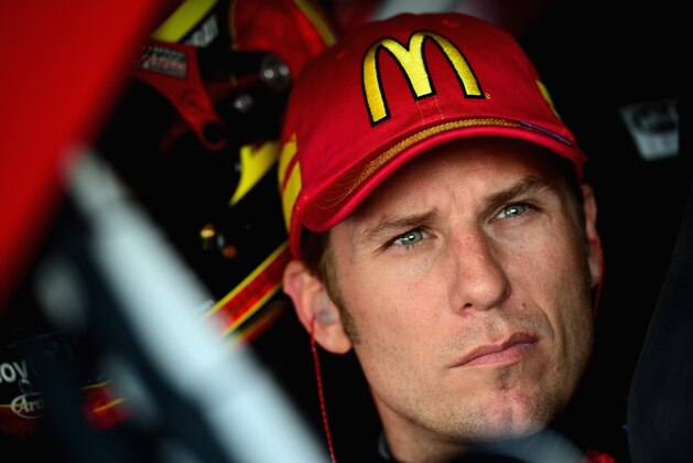 DOVER, DE - SEPTEMBER 27: Jamie McMurray, driver of the #1 McDonald's Chevrolet, sits in his car during practice for the NASCAR Sprint Cup Series AAA 400 at Dover International Speedway on September 27, 2014 in Dover, Delaware.  (Photo by Patrick Smith/Getty Images)