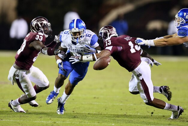 Oct 24, 2013; Starkville, MS, USA; Kentucky Wildcats wide receiver A.J. Legree (6) misses a passing play that is broken up by Mississippi State Bulldogs defensive back Kivon Coman (33) and Mississippi State Bulldogs defensive back Cedric Jiles (13) during the game at Davis Wade Stadium. Mississippi State Bulldogs win the game against Kentucky Wildcats 28-22.  Mandatory Credit: Spruce Derden-USA TODAY Sports