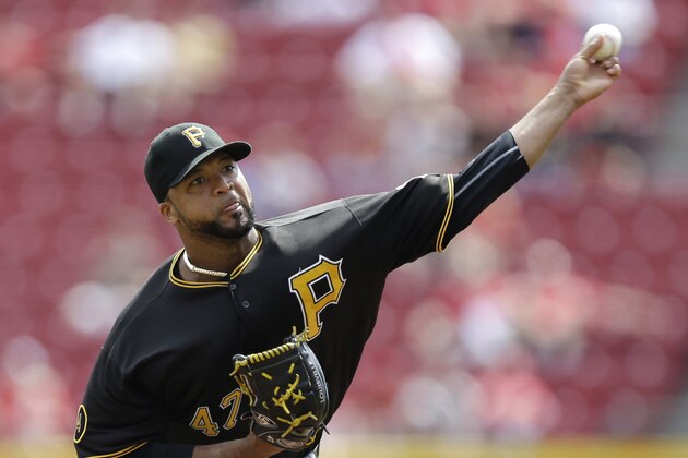 Pittsburgh Pirates starting pitcher Francisco Liriano throws against the Cincinnati Reds in the first inning of a baseball game, Saturday, Sept. 27, 2014, in Cincinnati. (AP Photo/Al Behrman)