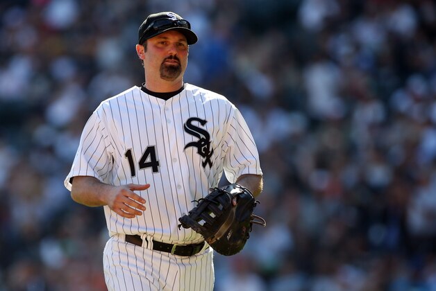 Sep 28, 2014; Chicago, IL, USA; Chicago White Sox first baseman Paul Konerko (14) heads back to the dugout after the top of the fourth inning against the Kansas City Royals at U.S Cellular Field. Mandatory Credit: Jerry Lai-USA TODAY Sports