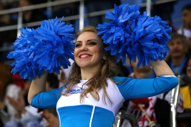 SOCHI, RUSSIA - FEBRUARY 09: A cheerleader is seen during the Women's Ice Hockey Preliminary Round Group B Game on day two of the Sochi 2014 Winter Olympics at Shayba Arena on February 9, 2014 in Sochi, Russia.  (Photo by Bruce Bennett/Getty Images)