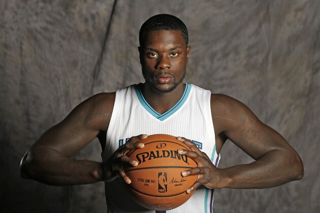 Charlotte Hornets' Lance Stephenson poses for a photo during the NBA basketball team's media day in Charlotte, N.C., Monday, Sept. 29, 2014. (AP Photo/Chuck Burton)
