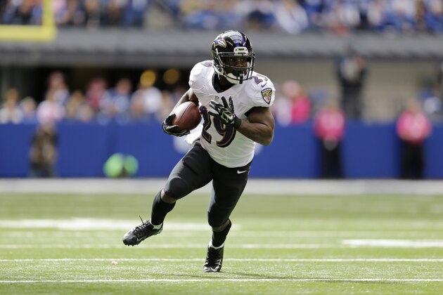 Baltimore Ravens running back Justin Forsett runs against the Indianapolis Colts during the first half of an NFL football game in Indianapolis, Sunday, Oct. 5, 2014. (AP Photo/Jeff Roberson)