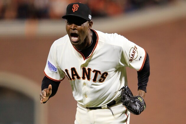 SAN FRANCISCO, CA - OCTOBER 24:  Santiago Casilla #46 of the San Francisco Giants reacts after getting the final out in the ninth inning against the Kansas City Royals during Game Three of the 2014 World Series at AT&T Park on October 24, 2014 in San Francisco, California.  (Photo by Jamie Squire/Getty Images)
