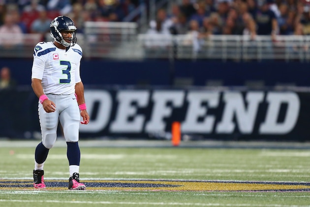 ST. LOUIS, MO - OCTOBER 19: Russell Wilson #3 of the Seattle Seahawks looks to the sideline in the first quarter against the St. Louis Rams at the Edward Jones Dome on October 19, 2014 in St. Louis, Missouri. The Rams beat the Seahawks 28-26. (Photo by Dilip Vishwanat/Getty Images) ST. LOUIS, MO - OCTOBER 19: Russell Wilson #3 of the Seattle Seahawks looks to the sideline in the first quarter against the St. Louis Rams at the Edward Jones Dome on October 19, 2014 in St. Louis, Missouri. The Rams beat the Seahawks 28-26. (Photo by Dilip Vishwanat/Getty Images)