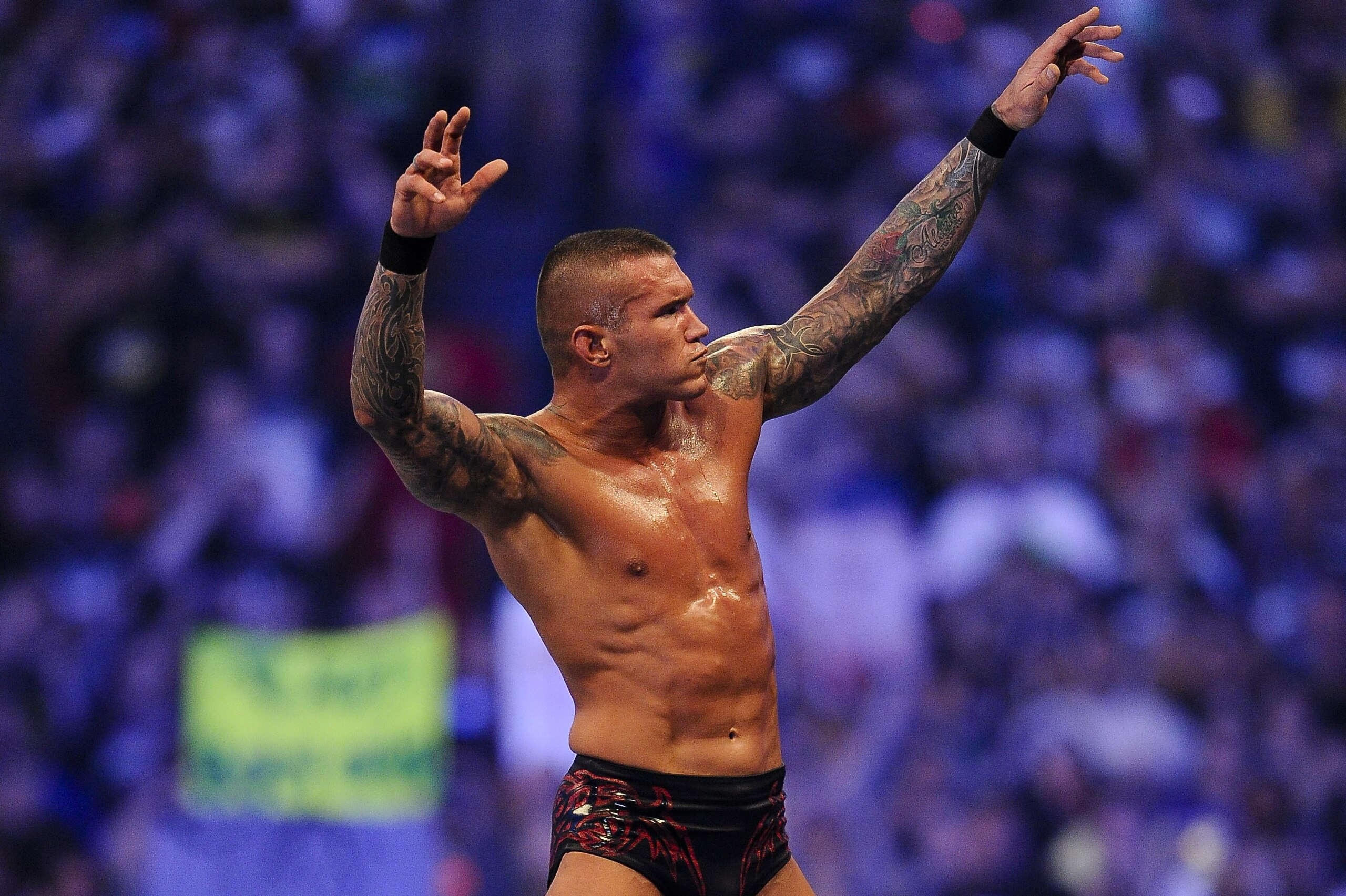 WWE Superstar Randy Orton celebrates defeating CM Punk (not pictured) during WrestleMania XXVII at the Georgia Dome in Atlanta, Georgia on Sunday, April 3, 2011. (Paul Abell/AP Images for WWE)