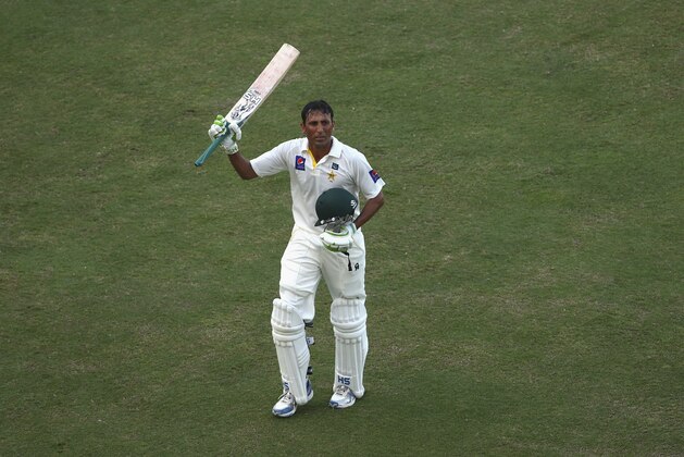 DUBAI, UNITED ARAB EMIRATES - OCTOBER 25:  Younis Khan of Pakistan celebrates after reaching his century during Day Four of the First Test between Pakistan and Australia at Dubai International Stadium on October 25, 2014 in Dubai, United Arab Emirates.  (Photo by Ryan Pierse/Getty Images)