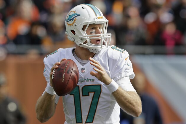 Miami Dolphins quarterback Ryan Tannehill (17) looks for a receiver during the first half of an NFL football game against the Chicago Bears Sunday, Oct. 19, 2014 in Chicago. (AP Photo/Nam Y. Huh) Miami Dolphins quarterback Ryan Tannehill (17) looks for a receiver during the first half of an NFL football game against the Chicago Bears Sunday, Oct. 19, 2014 in Chicago. (AP Photo/Nam Y. Huh)