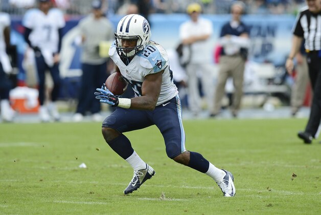 Tennessee Titans running back Bishop Sankey (20) carries the ball against the Jacksonville Jaguars in the third quarter of an NFL football game Sunday, Oct. 12, 2014, in Nashville, Tenn. (AP Photo/Mark Zaleski)