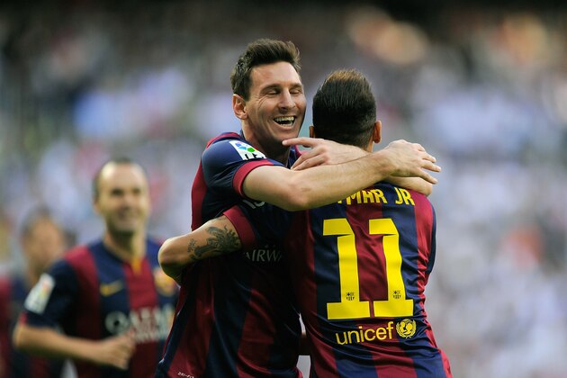MADRID, SPAIN - OCTOBER 25:  Neymar of FC Barcelona celebrates with Lionel Messi after scoring his team's opening goal during the La Liga match between Real Madrid CF and FC Barcelona at Estadio Santiago Bernabeu on October 25, 2014 in Madrid, Spain.  (Photo by Denis Doyle/Getty Images)