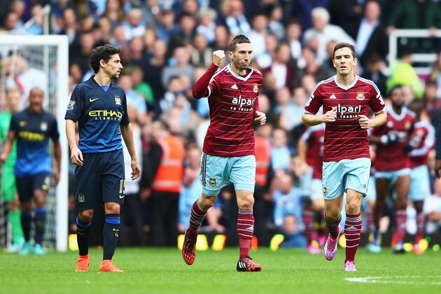 LONDON, ENGLAND - OCTOBER 25: Morgan Amalfitano of West Ham United celebrates scoring the opening goal during the Barclays Premier League match between West Ham United and Manchester City at Boleyn Ground on October 25, 2014 in London, England.  (Photo by Ian Walton/Getty Images)