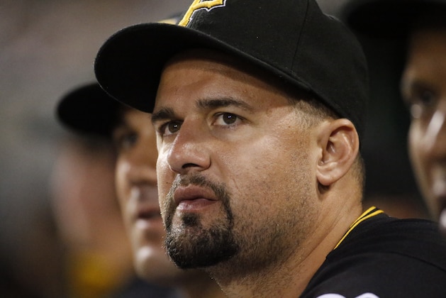 Pittsburgh Pirates' Gaby Sanchez sits in the dugout during the sixth inning of a baseball game against the Cincinnati Reds in Pittsburgh Friday, Aug. 29, 2014. The Pirates own 2-1. (AP Photo/Gene J. Puskar)
