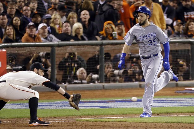 Kansas City Royals' Eric Hosmer is out at first during the ninth inning of Game 3 of baseball's World Series against the San Francisco Giants on Friday, Oct. 24, 2014, in San Francisco. (AP Photo/Charlie Riedel)