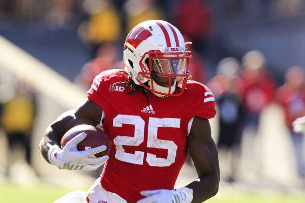 Wisconsin running back Melvin Gordon (25) runs against Maryland during the second half of an NCAA college football game Saturday, Oct. 25, 2014, in Madison, Wis. Wisconsin won 52-7. (AP Photo/Andy Manis)