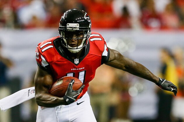ATLANTA, GA - AUGUST 23: Julio Jones #11 of the Atlanta Falcons runs after a catch for a touchdown in the first half of a preseason game against the Tennessee Titans at the Georgia Dome on August 23, 2014 in Atlanta, Georgia.  (Photo by Kevin C. Cox/Getty Images)
