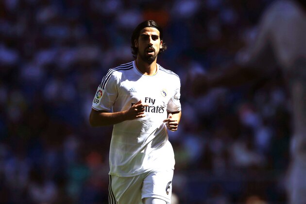 Real Madrid's Sami Khedira from Germany runs during a Spanish La Liga soccer match between Real Madrid and Espanyol at the Santiago Bernabeu stadium  in Madrid, Spain, Saturday, May 17, 2014 . (AP Photo/Daniel Ochoa de Olza)