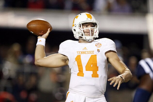 Tennessee quarterback Justin Worley (14) passes against Mississippi in the first half of an NCAA college football game in Oxford, Miss., Saturday, Oct. 18, 2014. No. 3 Mississippi won 34-3. (AP Photo/Rogelio V. Solis)