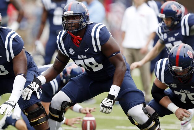 Mississippi offensive linesman Laremy Tunsil (78) steps into his blocking stance during pre-game warmups prior to an NCAA college football game against Louisiana-Lafayette at Vaught-Hemingway Stadium in Oxford, Miss., Saturday, Sept. 13, 2014. (AP Photo/Rogelio V. Solis)