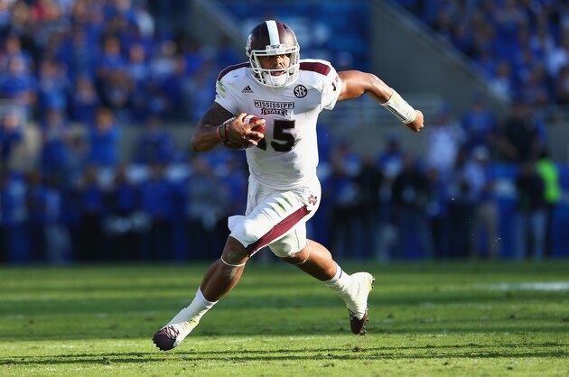 LEXINGTON, KY - OCTOBER 25:  Dak Prescott #15 of the Mississippi State Bulldogs runs with the ball during the game against the Kentucky Wildcats at Commonwealth Stadium on October 25, 2014 in Lexington, Kentucky.  (Photo by Andy Lyons/Getty Images)