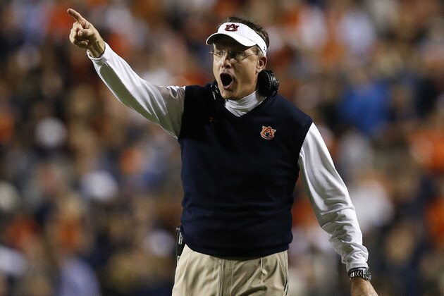 Auburn head coach Gus Malzahn yells towards a  referee during the second half of an NCAA college football game on Saturday, Oct. 25, 2014, in Auburn, Ala. (AP Photo/Brynn Anderson)