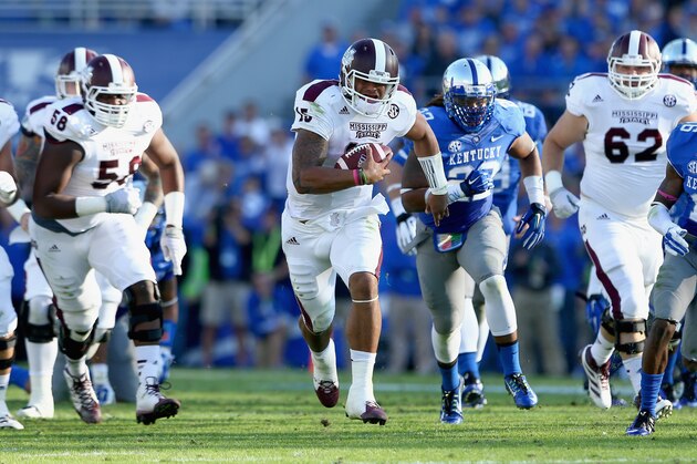 LEXINGTON, KY - OCTOBER 25:  Dak Prescott #15 of the Mississippi State Bulldogs runs with the ball during the game against the Kentucky Wildcats at Commonwealth Stadium on October 25, 2014 in Lexington, Kentucky.  (Photo by Andy Lyons/Getty Images)